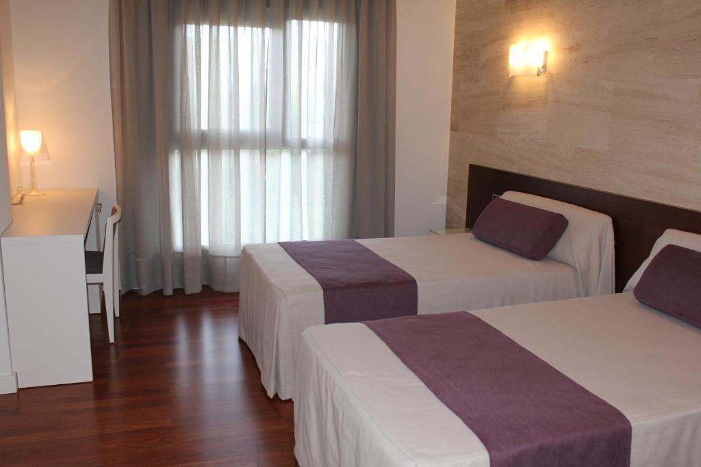 Escuderos Hotel Cruz Аргамасилья-де-Калатрава Номер фото